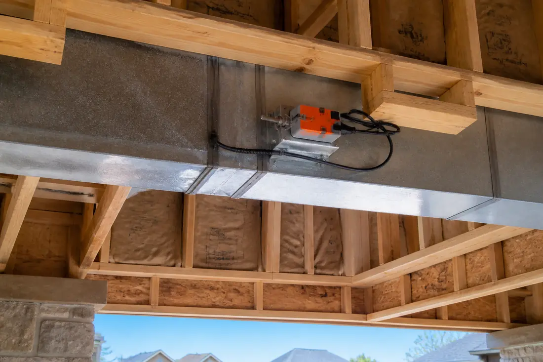 A motorized makeup air damper in a duct run